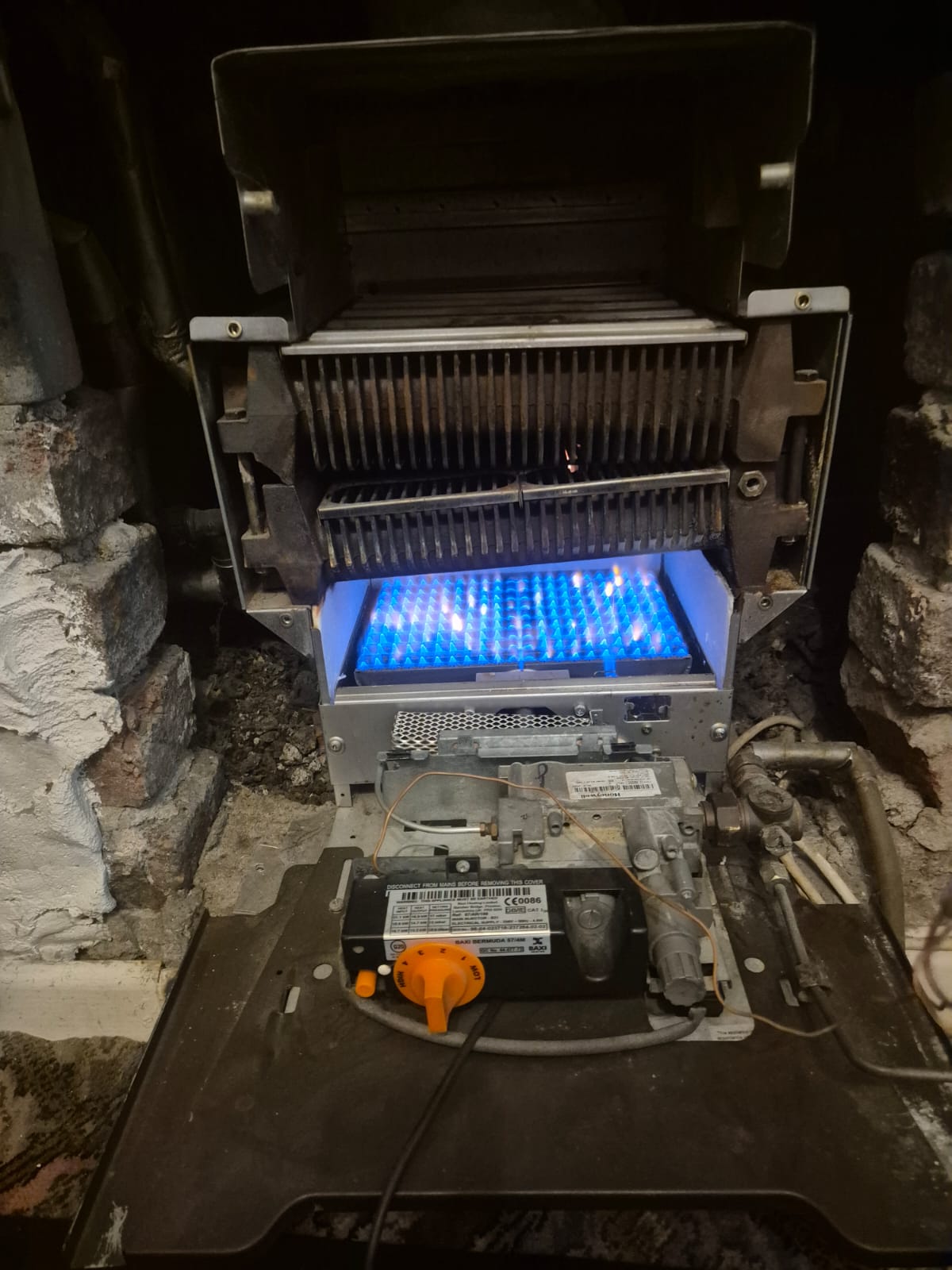 Back boiler burner inspection with flame