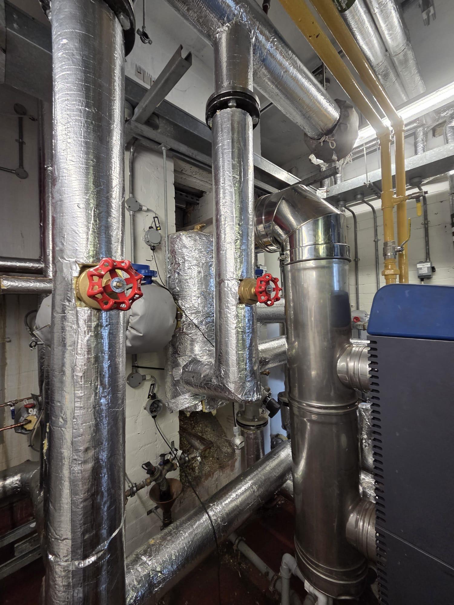 Commercial heating insulated pipework installation