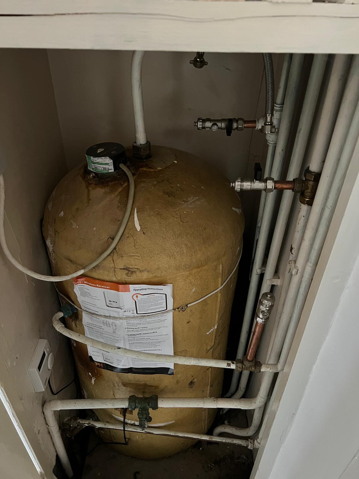 Hot water cylinder airing cupboard London